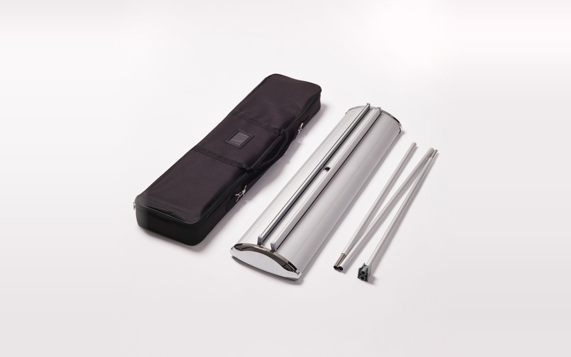 Lieferumfang Roll-Up Double Deluxe: Tasche, Kassette und Stangen